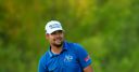 Moore secures narrow lead