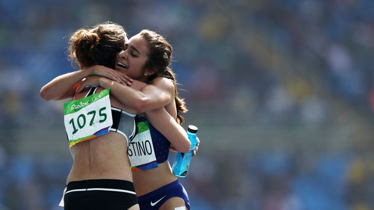 D'Agostino and Hamblin embrace after crossing the line