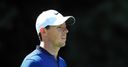 McIlroy battles back in Boston