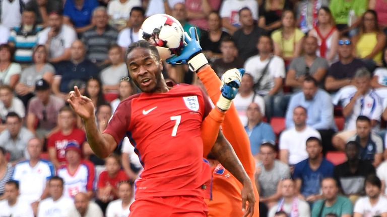 Raheem Sterling almost beat Slovakia goalkeeper Matus Kozacik to the ball early on.