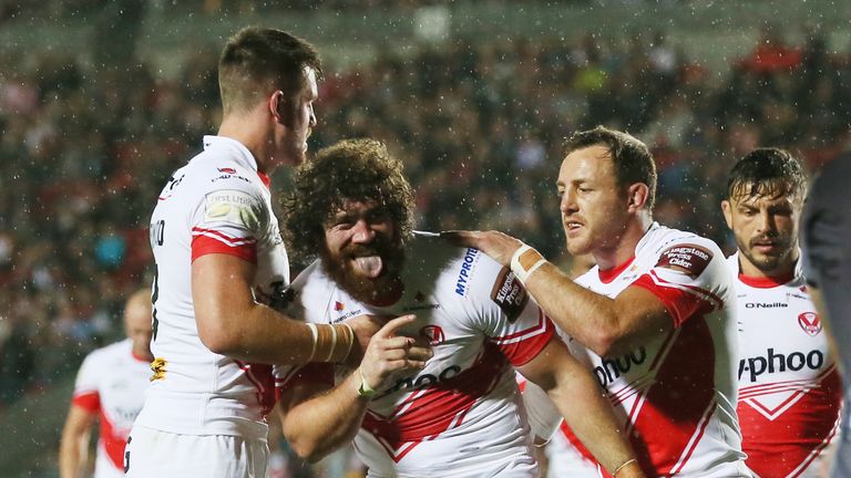 Kyle Amor celebrates scoring St Helens' third try