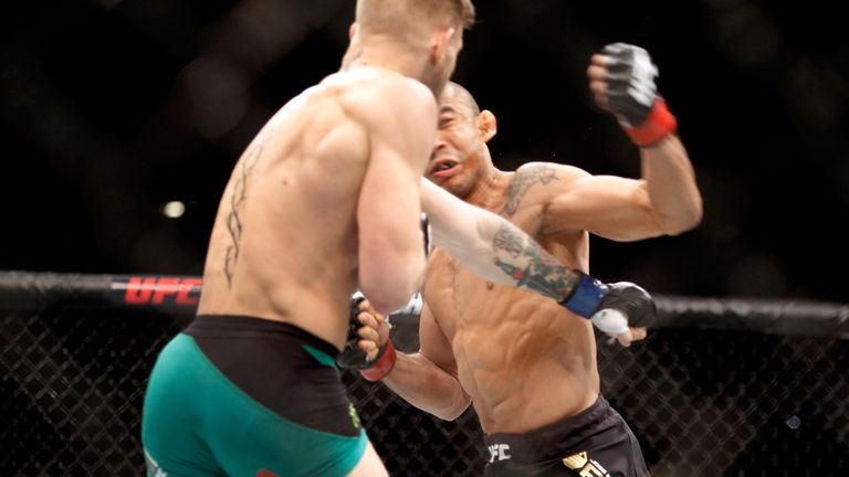 McGregor knocked out Aldo to become featherweight champion
