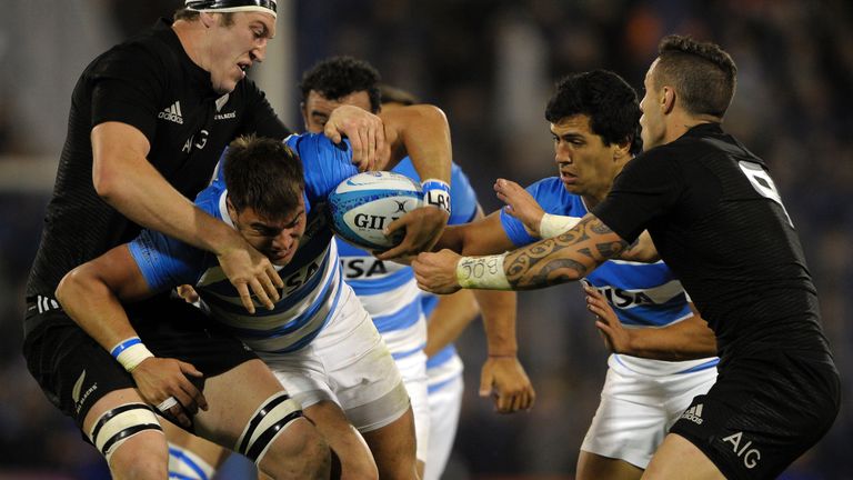 Facundo Isa takes on Brodie Retallick (L) and TJ Perenara