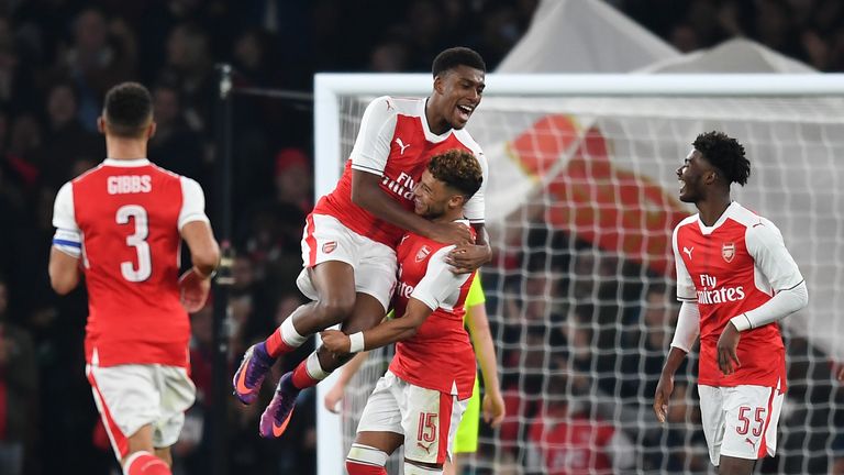 Alex Oxlade-Chamberlain mobbed after scoring for Arsenal