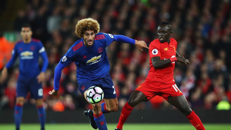 Sadio Mane of Liverpool challenges Marouane Fellaini of Manchester United during the goalless draw