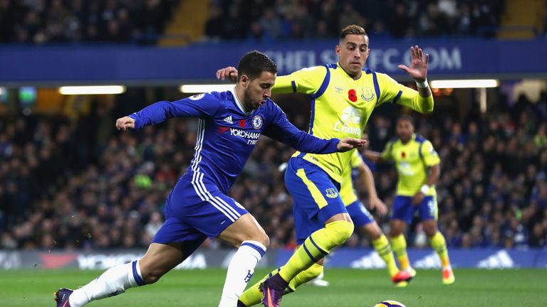 Hazard takes on Everton's Ramiro Funes Mori in the first half