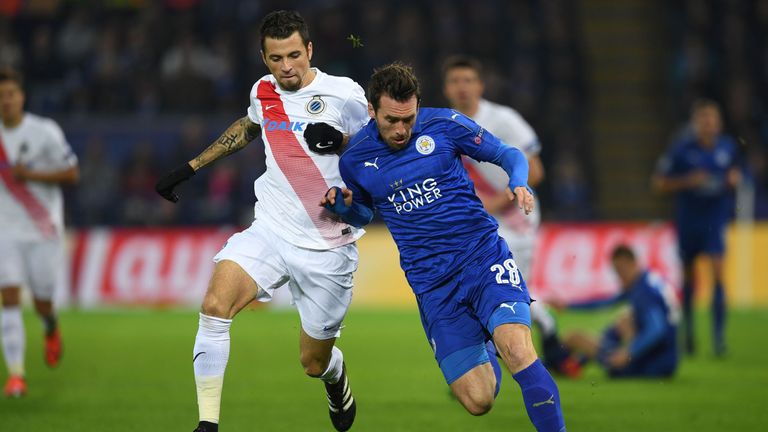 Christian Fuchs vies for the ball