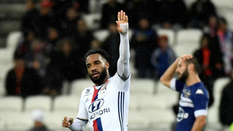 Alexandre Lacazette celebrates after scoring for Lyon