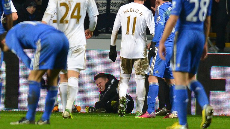 Swansea ball boy Charlie Morgan reacts after an altercation with Chelsea