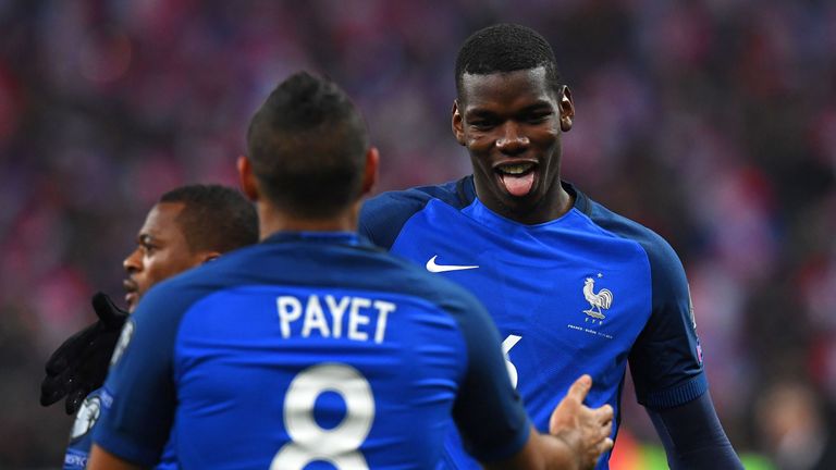 Paul Pogba celebrates with fellow-goalscorer Dimitri Payet