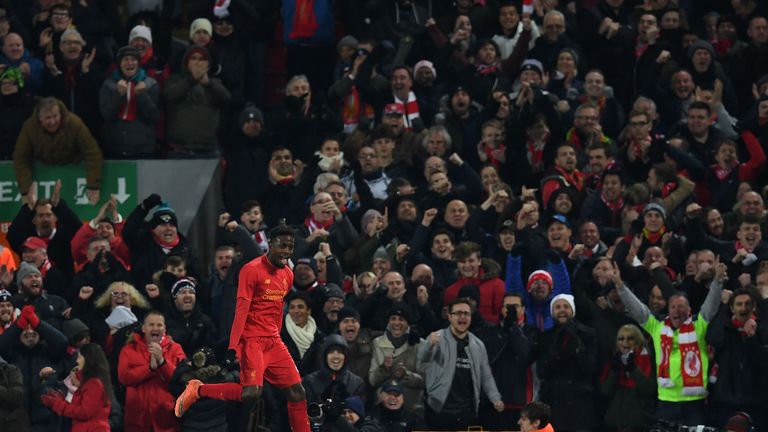 Liverpool's Belgian striker Divock Origi celebrates scoring his team's first goal