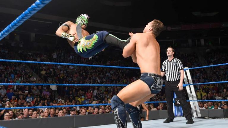 Kalisto dropkicks The Miz to the mat