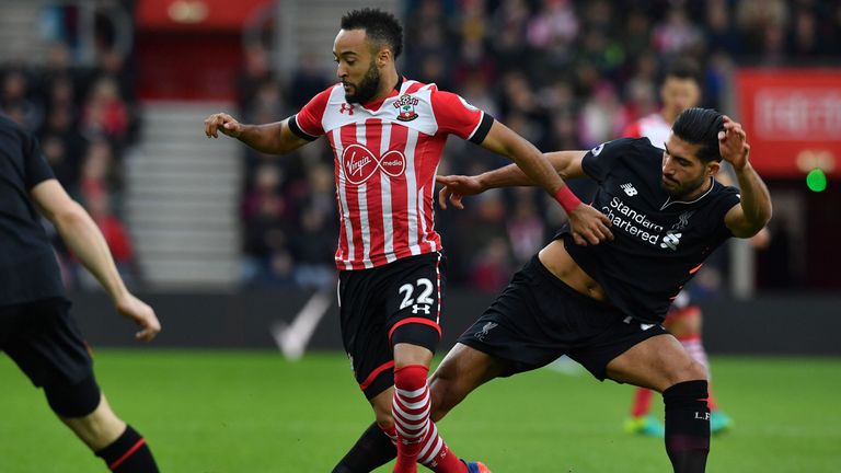 Southampton's Nathan Redmond (L) vies with Emre Can 