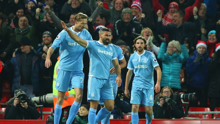 Jonathan Walters celebrates with team-mates as he scores their first goal