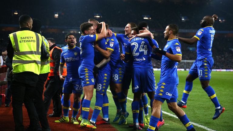 Jansson celebrates with his team-mates after he scores his side