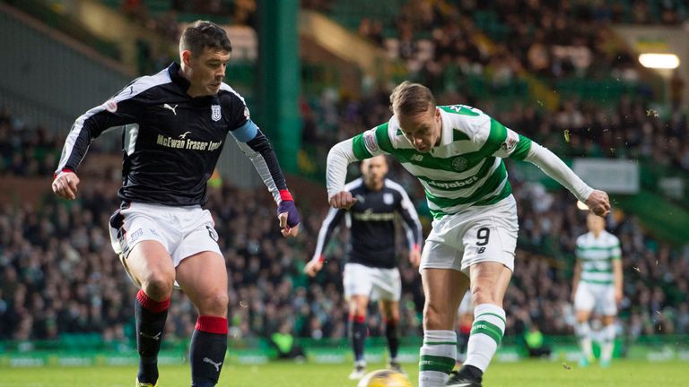 Griffiths (right) is closed down by former Parkhead stalwart Darren O'Dea