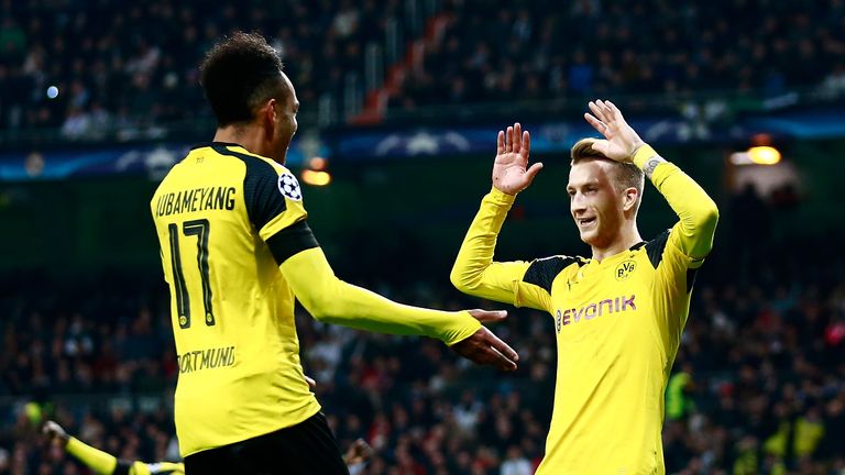 Marco Reus (R) scored late on to secure Dortmund a draw
