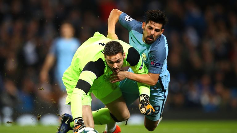 Craig Gordon and Nolito both challenge for the ball during the Champions League clash