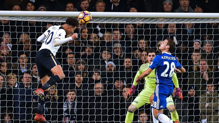 Alli directs his looping header into the top corner to put Spurs ahead