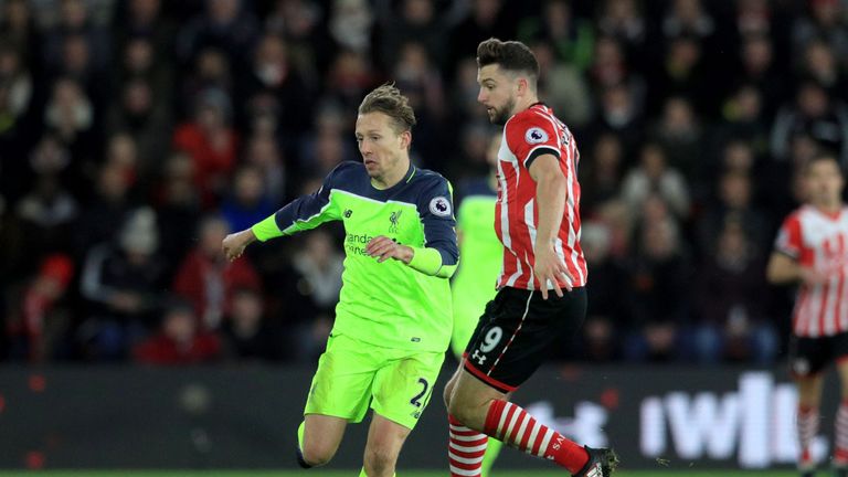 Lucas and Jay Rodriguez battle for the ball in the first half