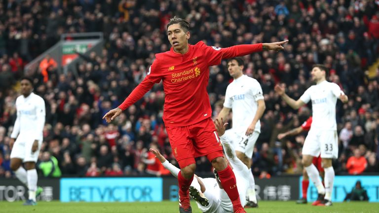 Roberto Firmino of Liverpool celebrates scoring his side's first goal