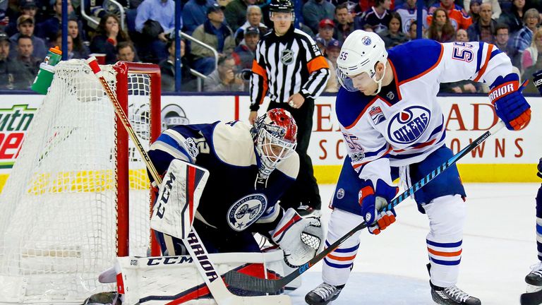 Sergei Bobrovsky makes one of his 21 saves to keep Mark Letestu from scoring for the Oilers