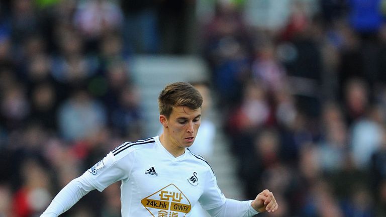 Tom Carroll spent the 2014-15 season on loan at Swansea