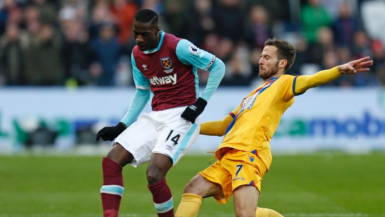 West Ham United's Pedro Obiang is tackled by Yohan Cabaye