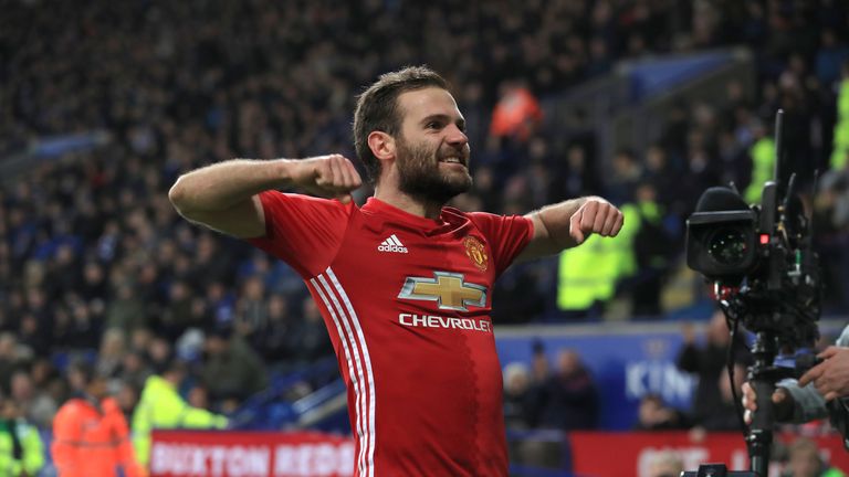 Mata celebrates scoring United's third goal