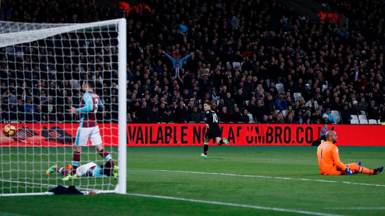 Eden Hazard (centre) turns away after scoring Chelsea's first goal against West Ham