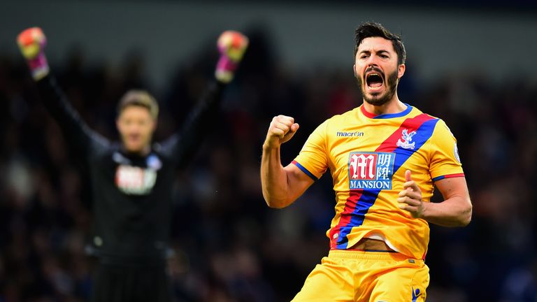 James Tomkins celebrates in front of the following Palace fans