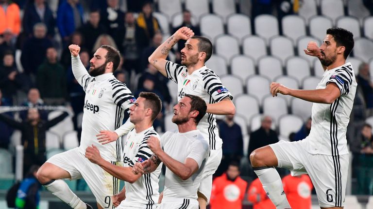 Juventus players celebrate with supporters 