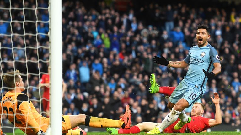 Sergio Aguero scores the second-half equaliser for Manchester City having been called onside by Stuart Burt