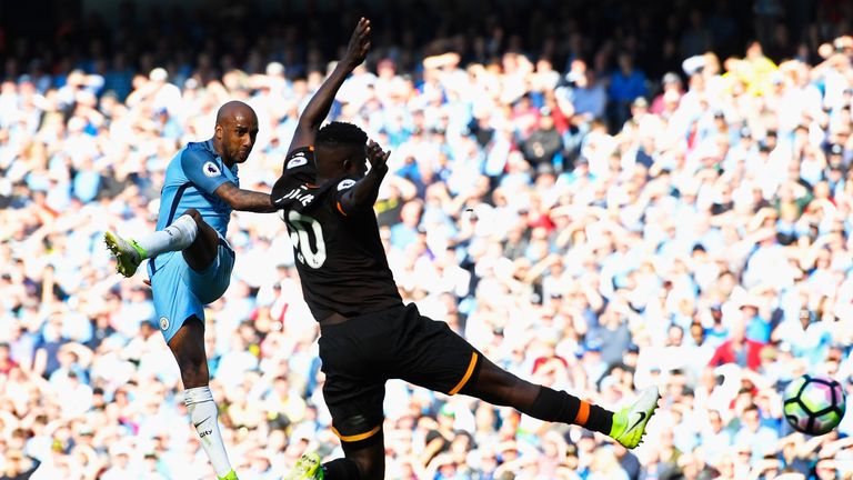 Fabian Delph drills home Manchester City's third goal at the Etihad