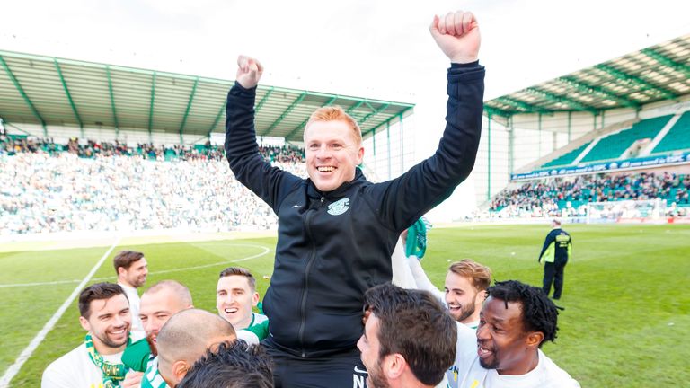 Neil Lennon celebrates promotion with his Hibernian team