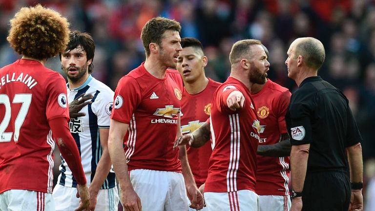 Wayne Rooney and Michael Carrick show their frustration
