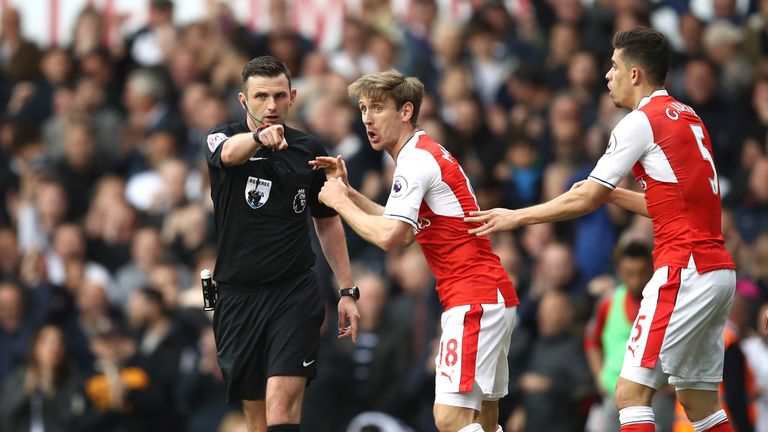Referee Michael Oliver awarded a penalty for Gabriel's challenge on Kane