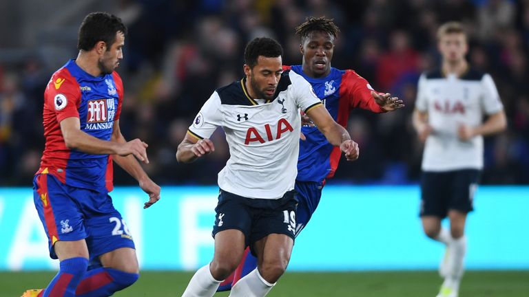 Mousa Dembele and Wilfried Zaha battle for the ball during the Selhurst Park encounter