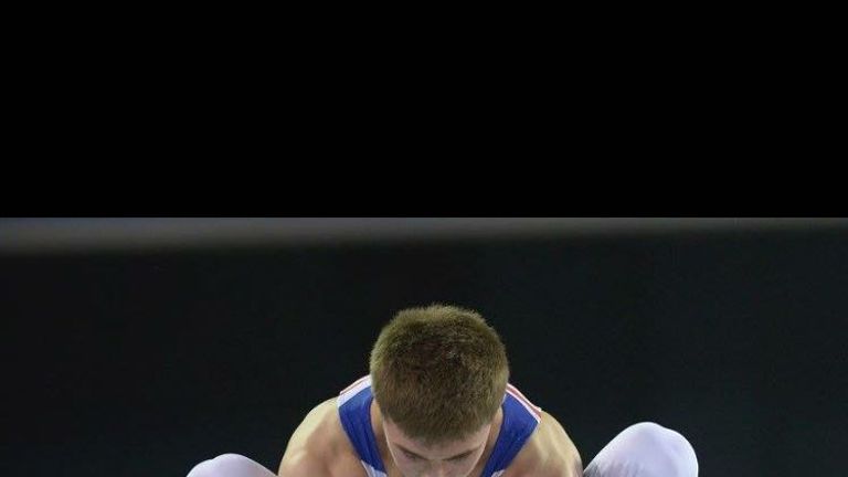 Sam gets a helping hand from his trusty coach at the European Championships