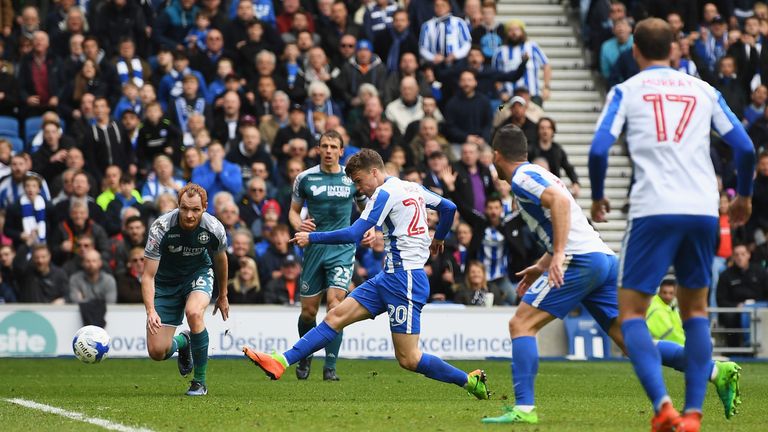 Solly March added a second before Nick Powell pulled one back for Wigan