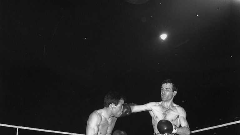 Walter McGowan (r) received an MBE for his achievements