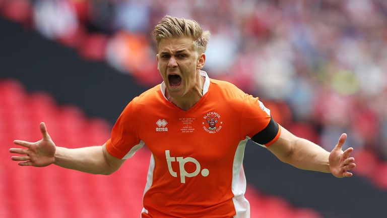 Brad Potts of Blackpool celebrates scoring his sides first goal