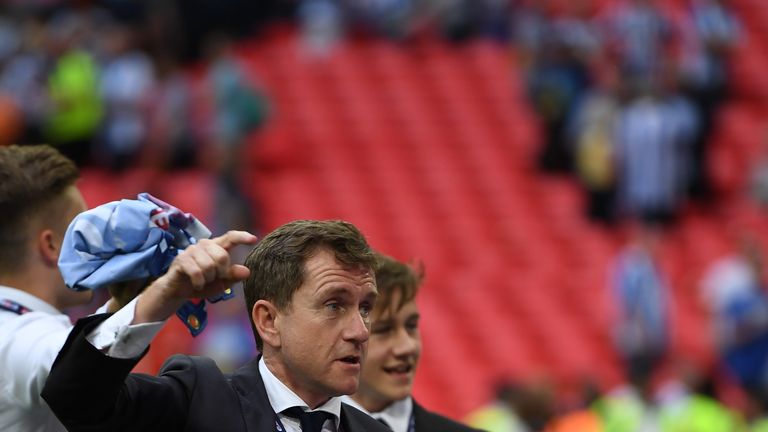 Dean Hoyle, chairman of Huddersfield Town, says it is the toughest decision he has undertaken in his time at the club