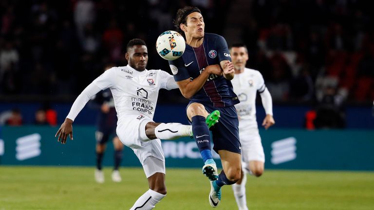 Caen secured their top-flight status with a battling draw with PSG