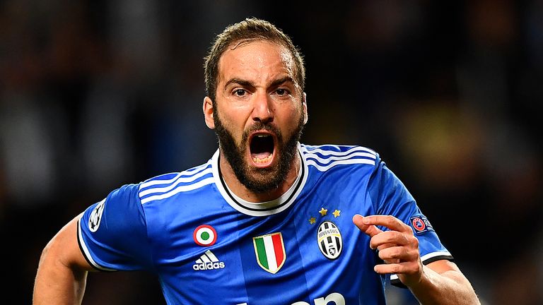 Gonzalo Higuain celebrates his sublime opener against Monaco