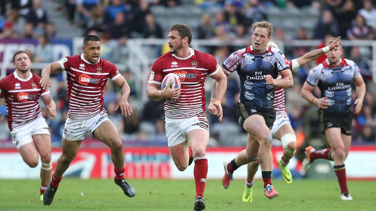 Wigan's Sean O'Loughlin breaks free from Warrington in their 2017 Magic Weekend thriller