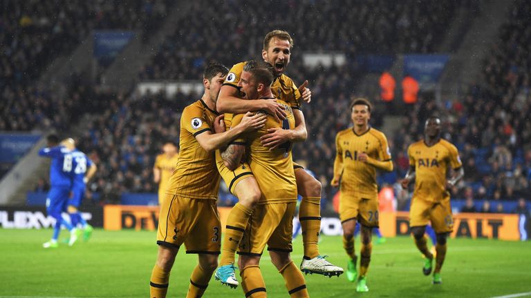 Kane celebrates Spurs' third goal with team-mates at the King Power