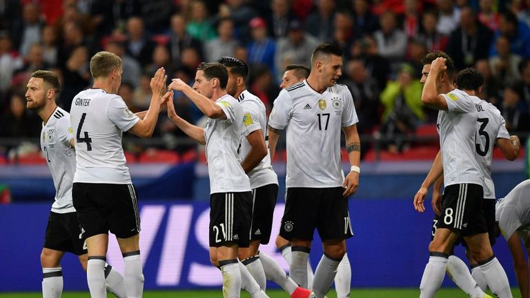 Germany's midfielder Lars Stindl (right) celebrates with team-mates 