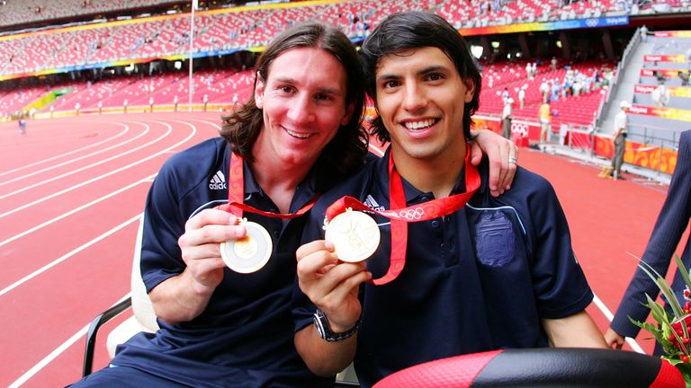 Lionel Messi (L) with Sergio Aguero after their gold-medal victory at the 2008 Beijing Olympics
