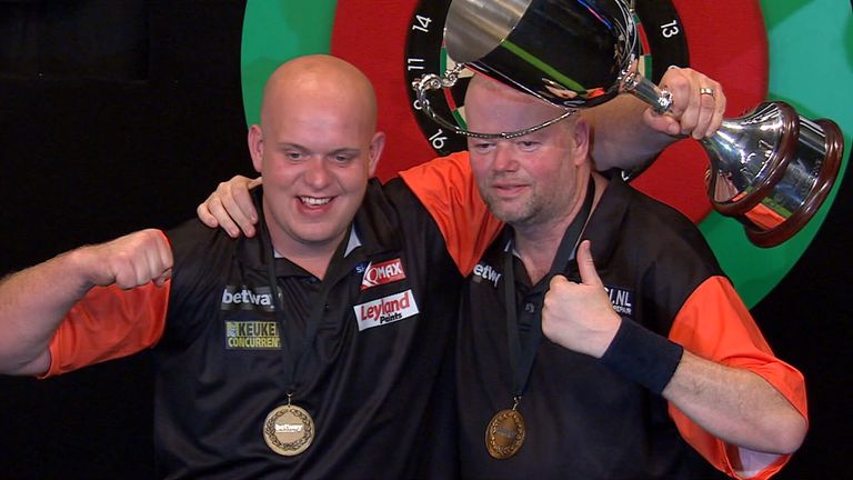 Michael van Gerwen and Raymond van Barneveld celebrate their World Cup win